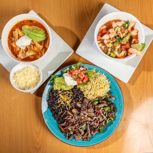 Three Mexican dishes: tortilla soup, shrimp ceviche, and a fajita plate with rice and beans.